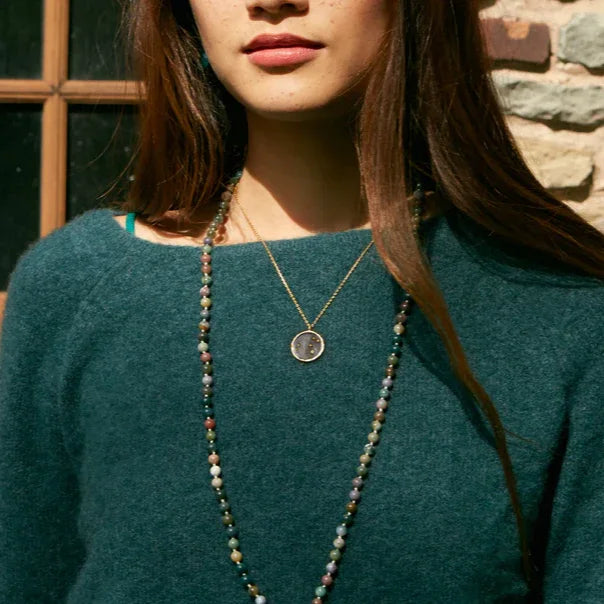 Leo Peridot Zodiac Necklace 18KT Gold Plated Brass 18" on Model with Sweater