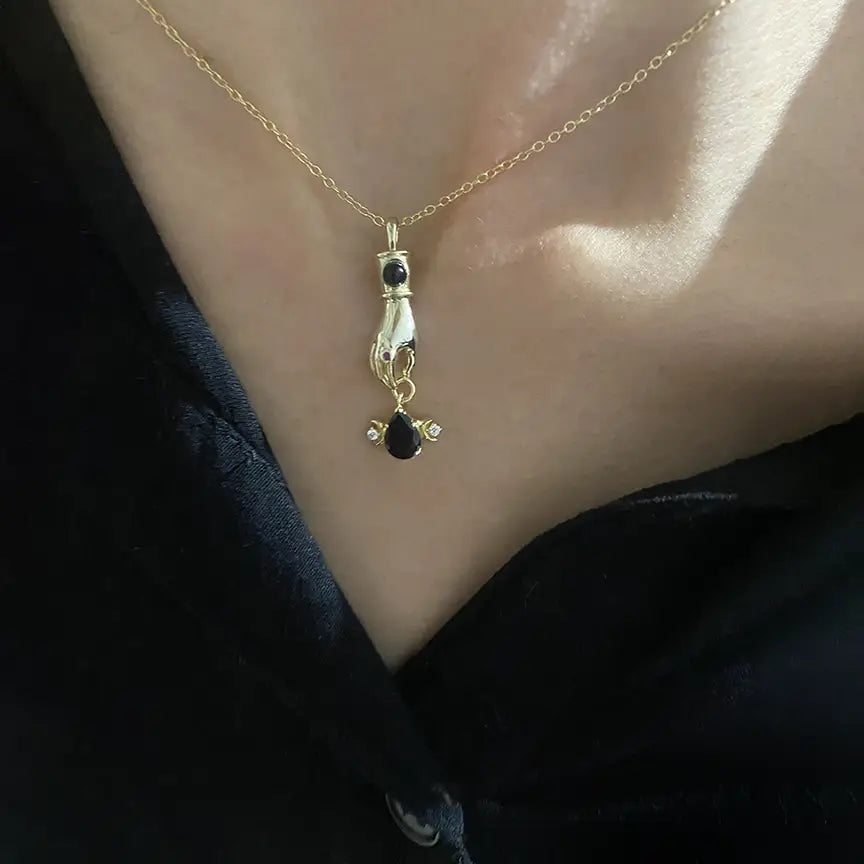 The Divine Hand Necklace on model