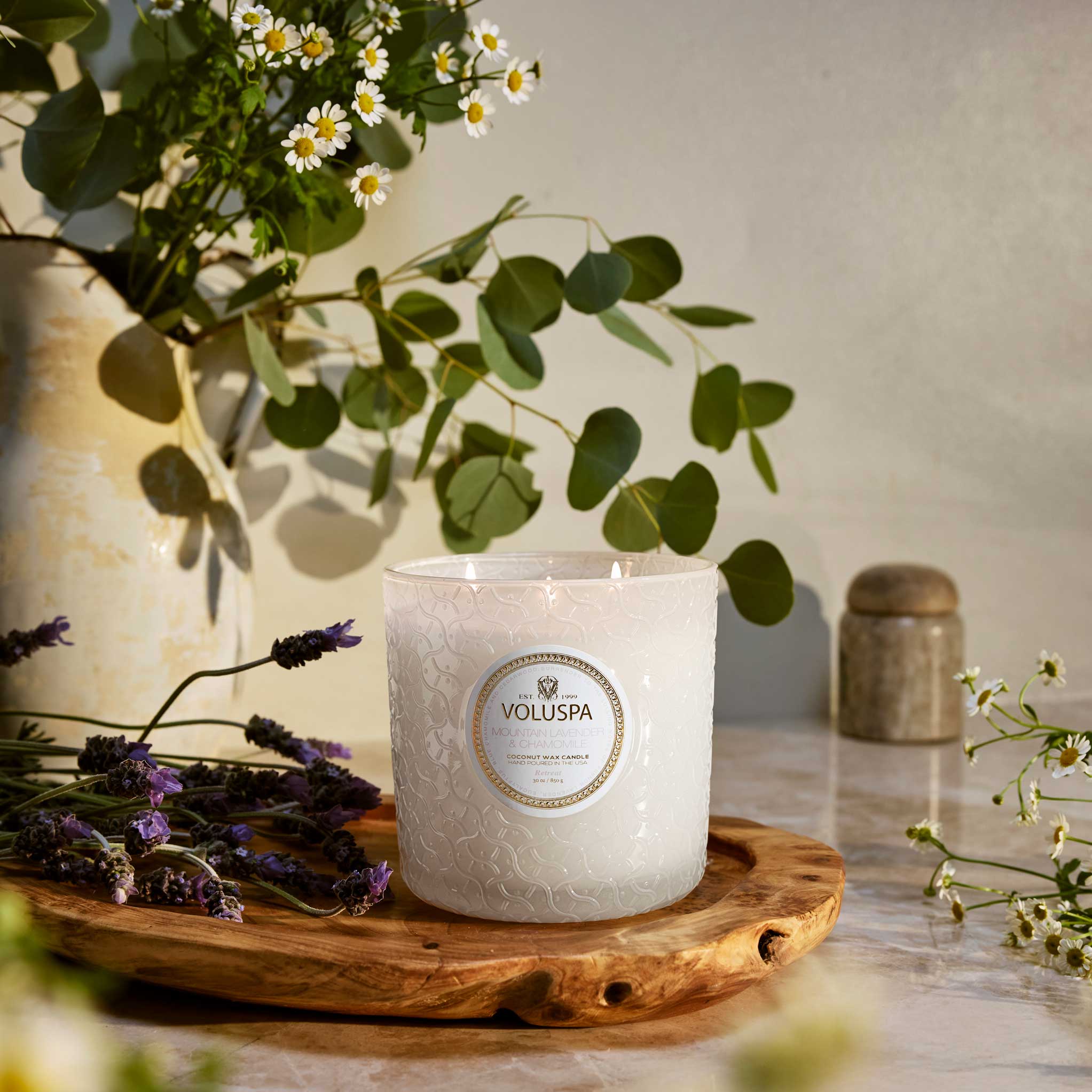 Mountain Lavender and Chamomile Luxe 3-wick Candle 30 oz with background