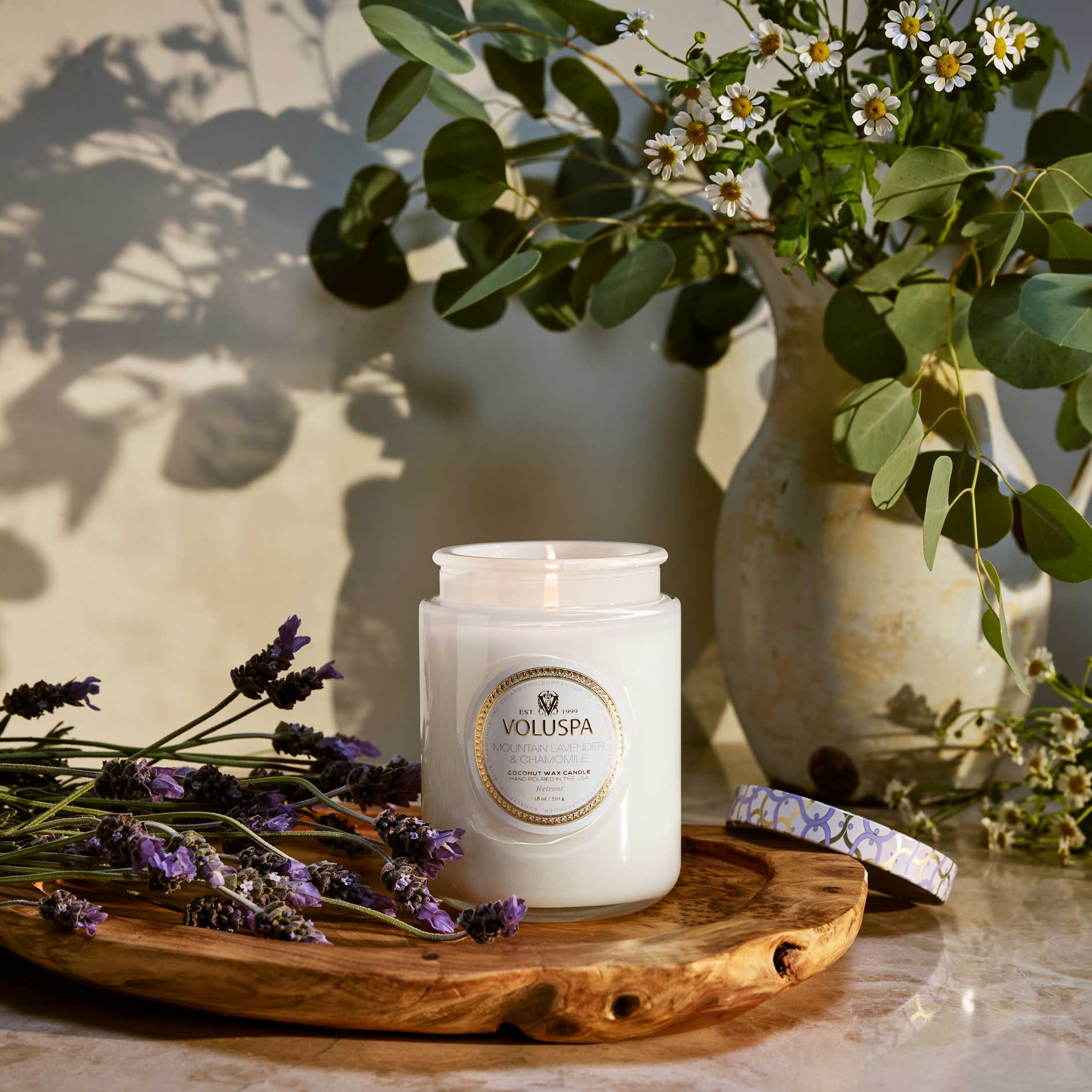 Mountain Lavender and Chamomile Large Jar Candle 18 oz on counter