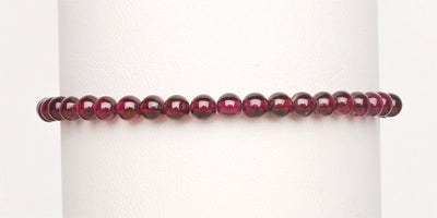 4mm Garnet Stretch Bracelet on Display stand